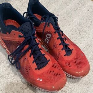 On Running Red and Navy Athletic Shoes